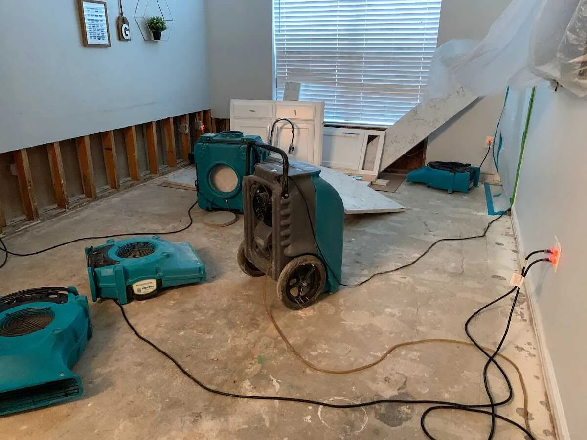Dehumidifier in flood-cut room for Water Damage Restoration in Beaumont
